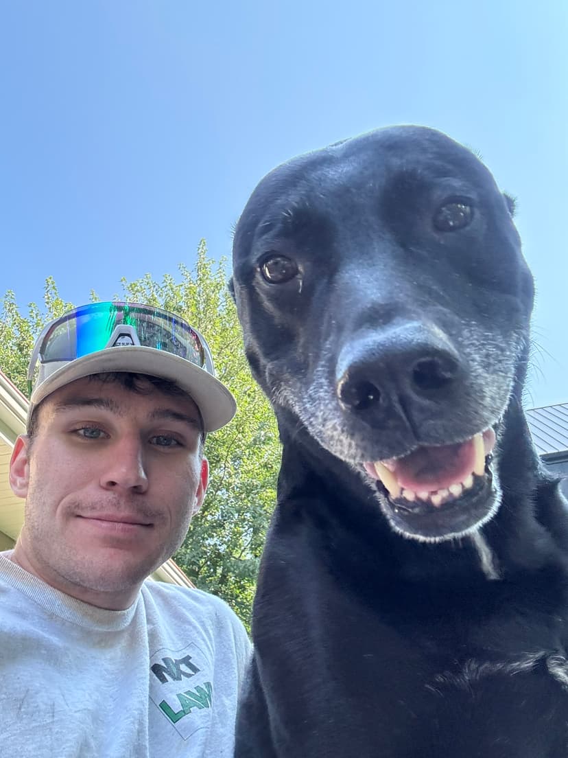 Nick, owner of NXT Lawn, with his dog — professional lawn care service in Mound, Minnesota
